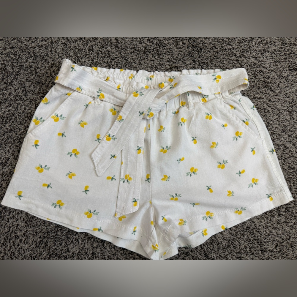 April Kiss white shorts with lemon print. Linen like,  tie belt. Small.